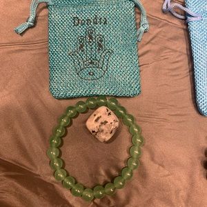 Handmade beaded bracelets and custom bags. Proce dependent on stone